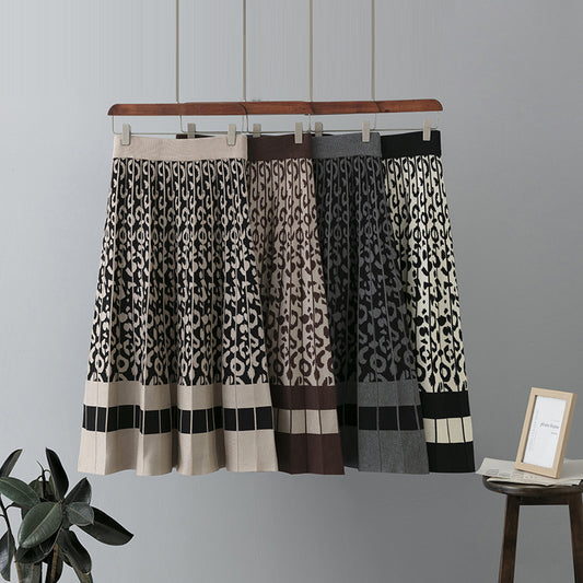 ZllKl In the autumn and winter of 2025, the new retro leopard print contrasting color knitted skirt for women's A-shaped pleated skirt with a large pendulum medium and long.